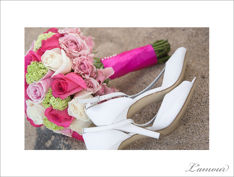 Fuscia Magenta Pink White and Green Wedding bouquet in the sand