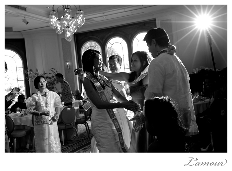 Hawaii Wedding Photographer L'Amour shot this Money Dance at the Moana Surfrider in Honolulu