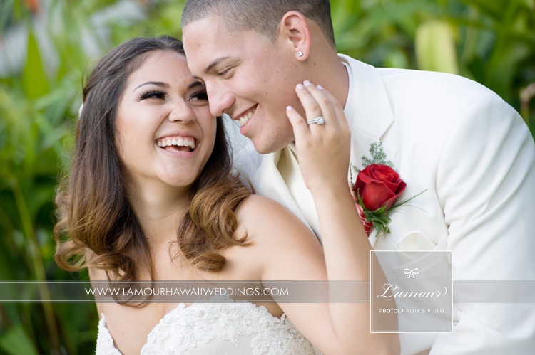 Hawaii Bride and Groom laugh on their red themed wedding day on Oahu