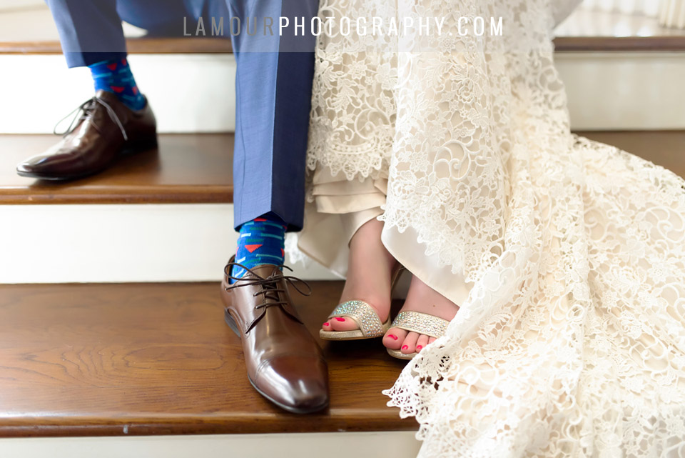 blue suit and lace dress with sparkly shoes and patterned socks at destination wedding in Hawaii