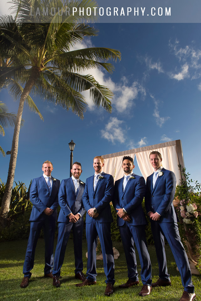 groomsmen at hawaii wedding in blue suits at Moana Surfrider