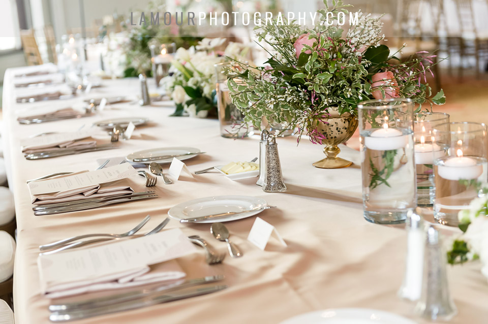 hawaii wedding reception table with floating candles blush pink and gold at the Moana Surfrider