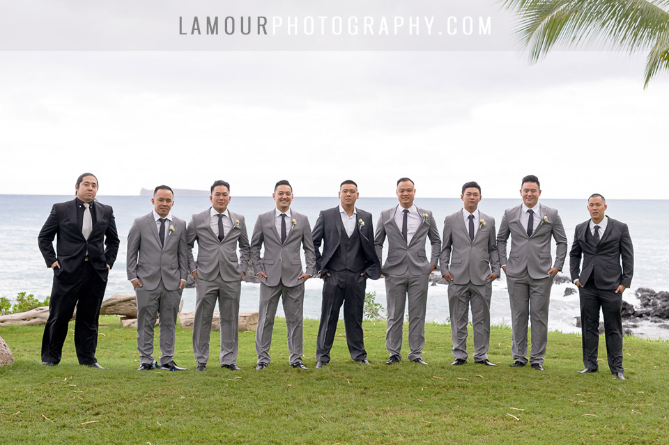 groom and groomsmen in grey suits at destination wedding in hawaii