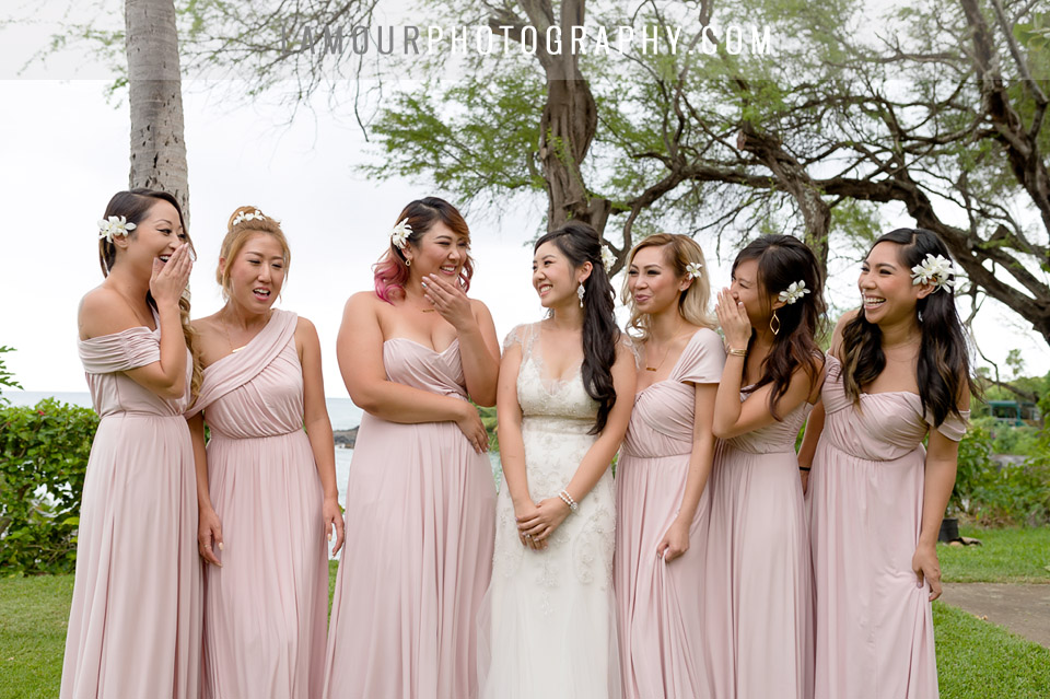 bridesmaids and bride in blush dresses for hawaii wedding