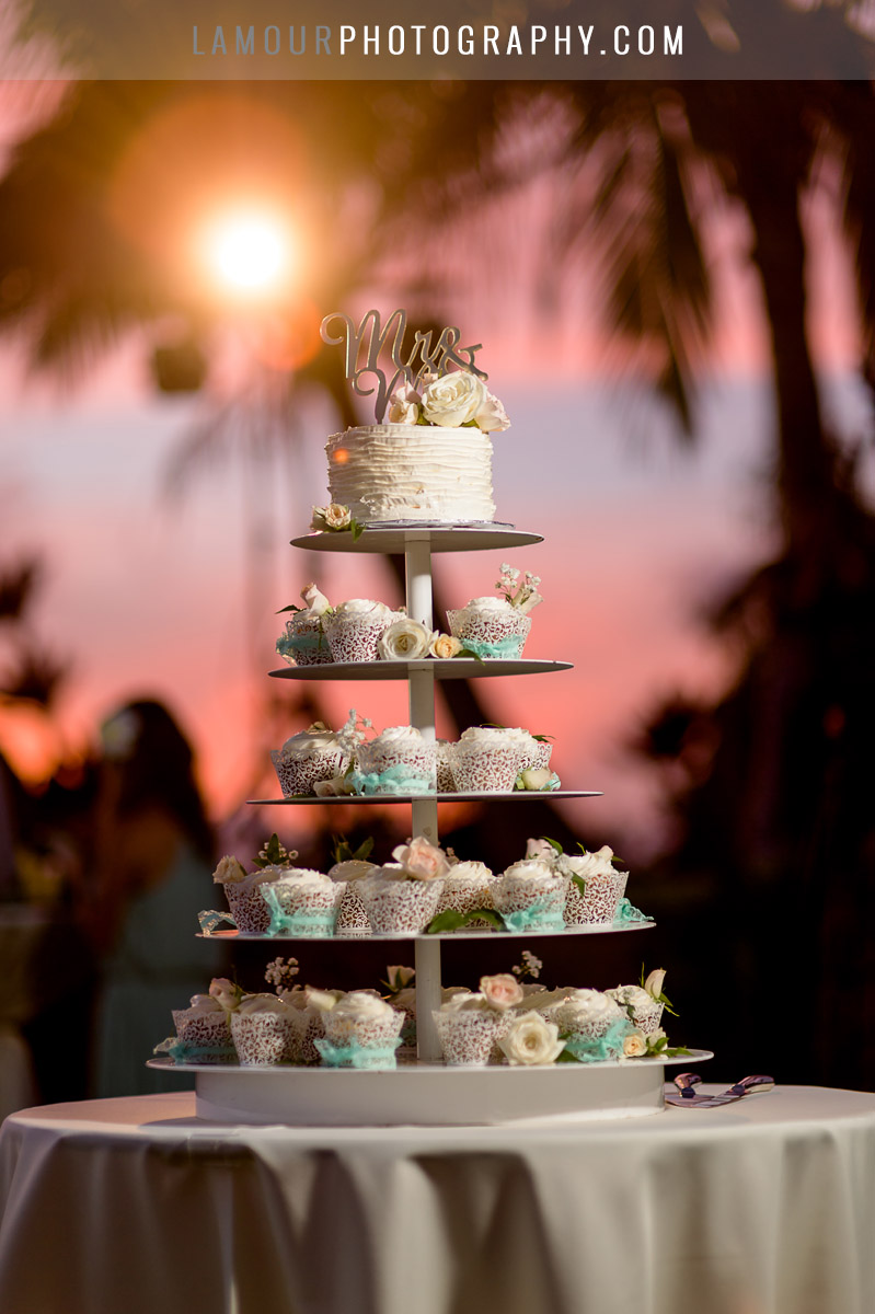 cupcake and wedding cake stand in hawaii wedding in maui