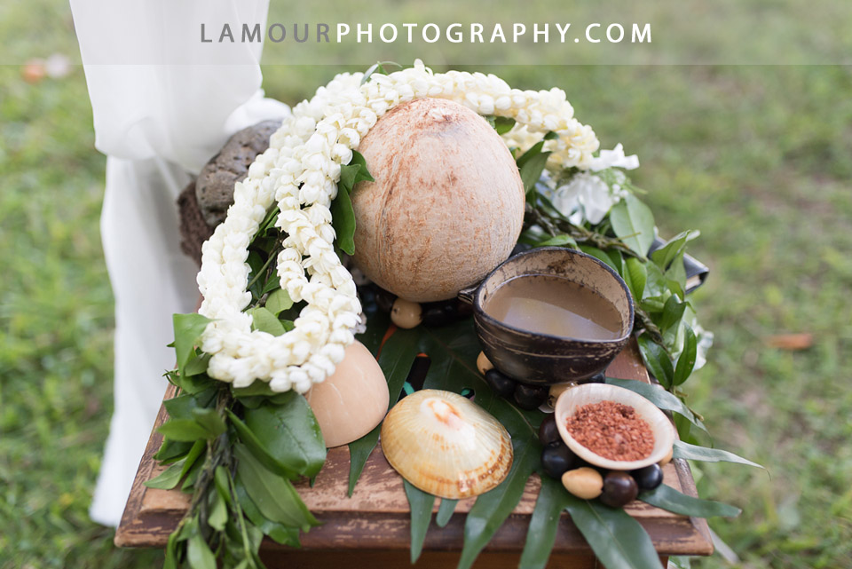 Hawaii wedding ceremony with flower lei and coconuts for Kualoa Ranch wedding on Oahu